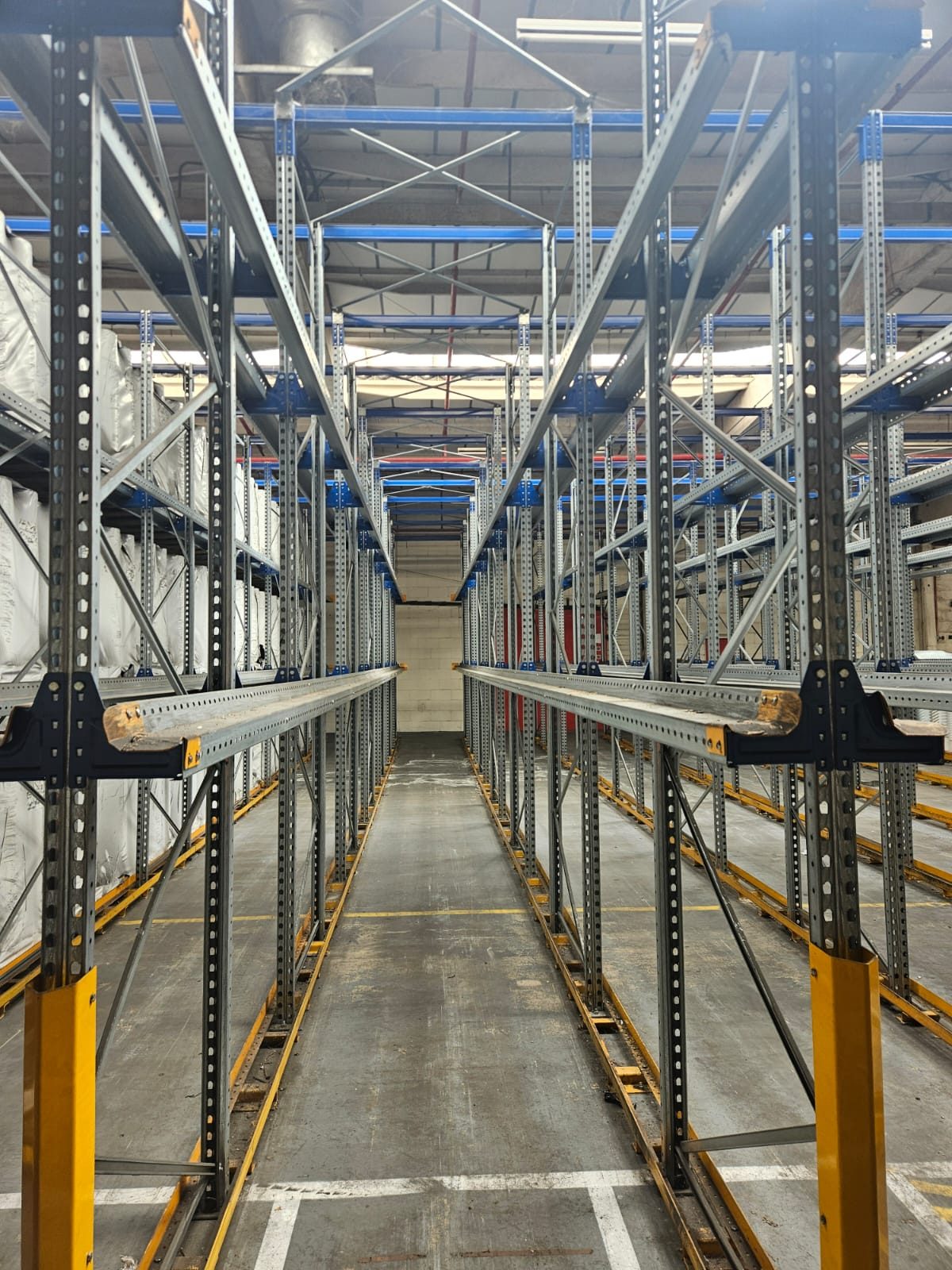 Pallet racking uprights and bracing