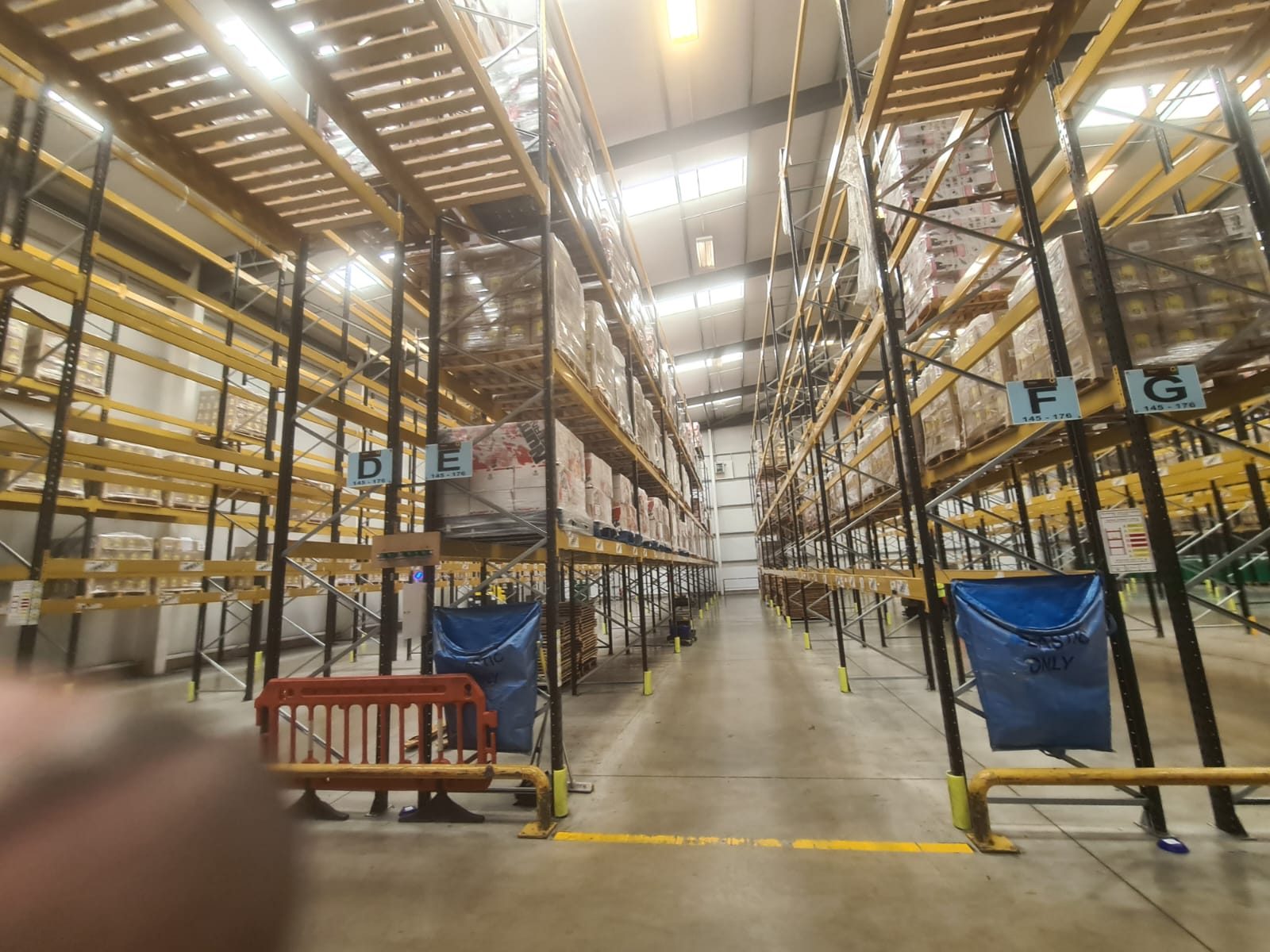 Tall pallet racking aisle